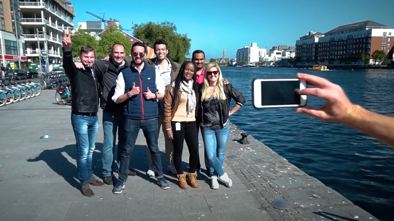 A group of people getting their picture taken for a Bentley Recruitment.