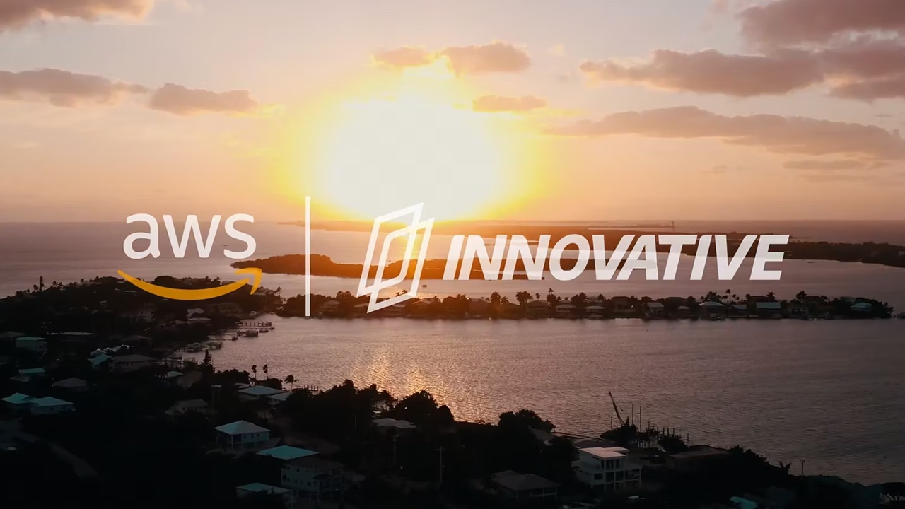 A beautiful picture of a beach town with text saying aws and innovation.