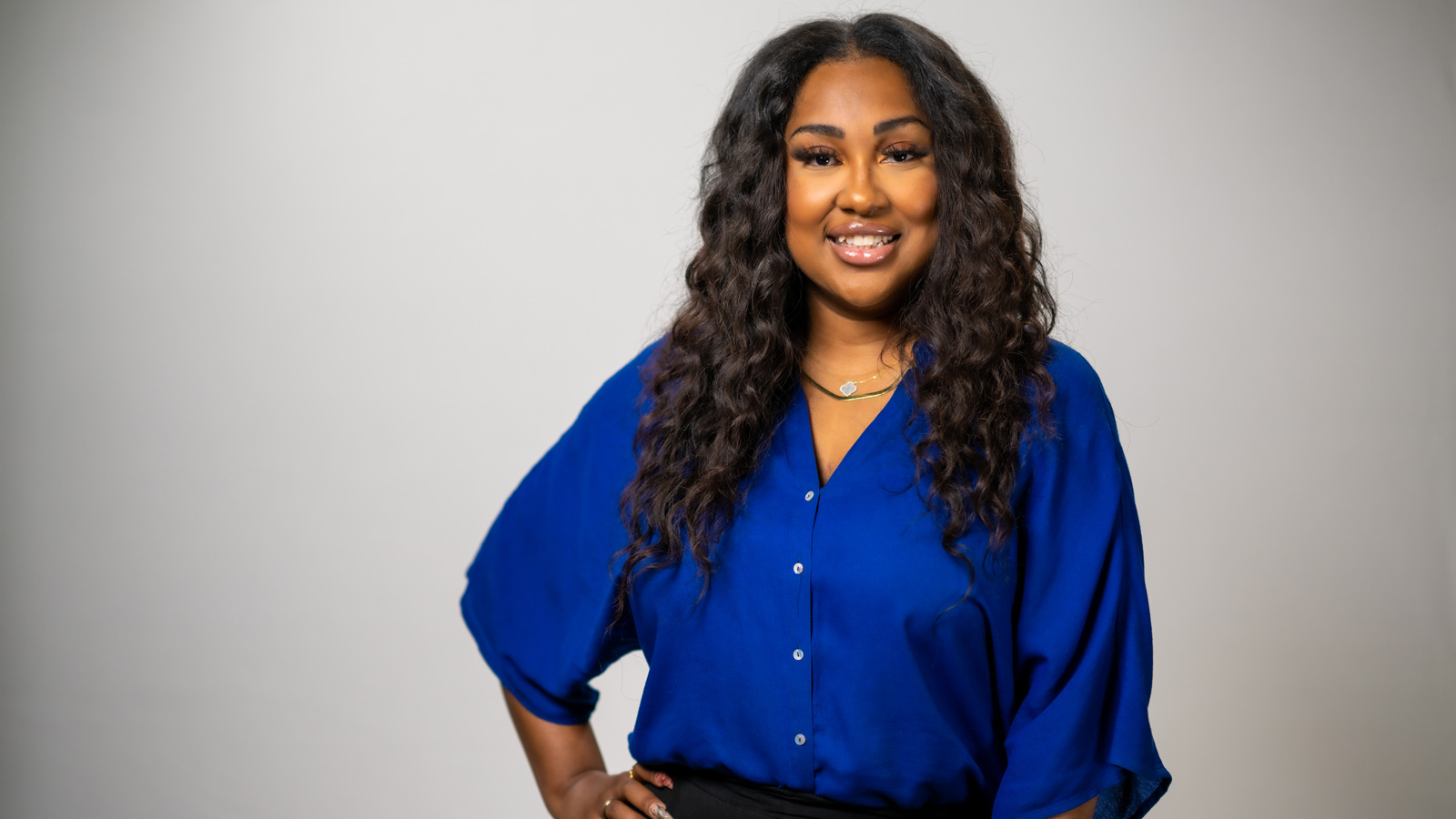 Happy woman blue shirt by K2 Productions Photography