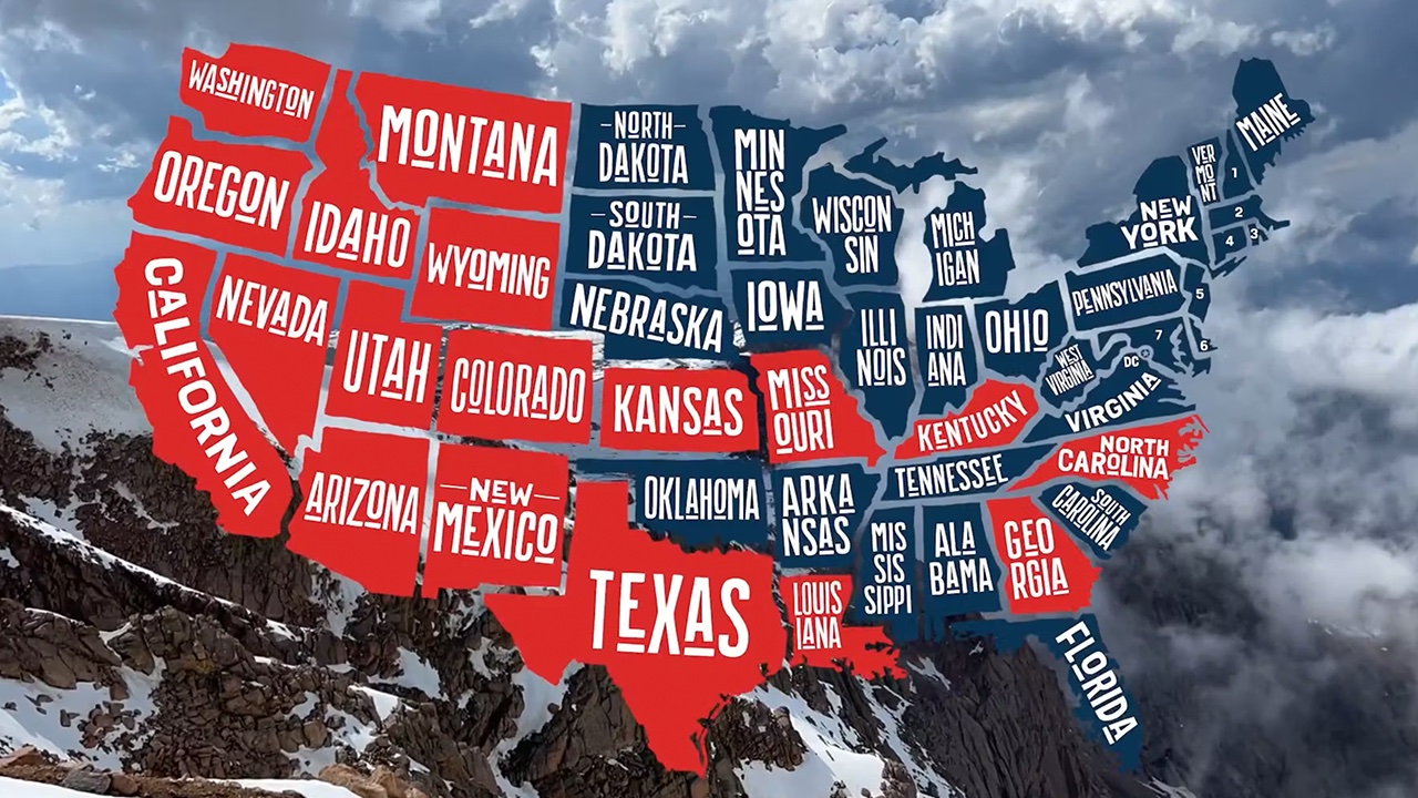 Mountains in the background of a map of all fifty states in the united states for a Grand Western tour video.