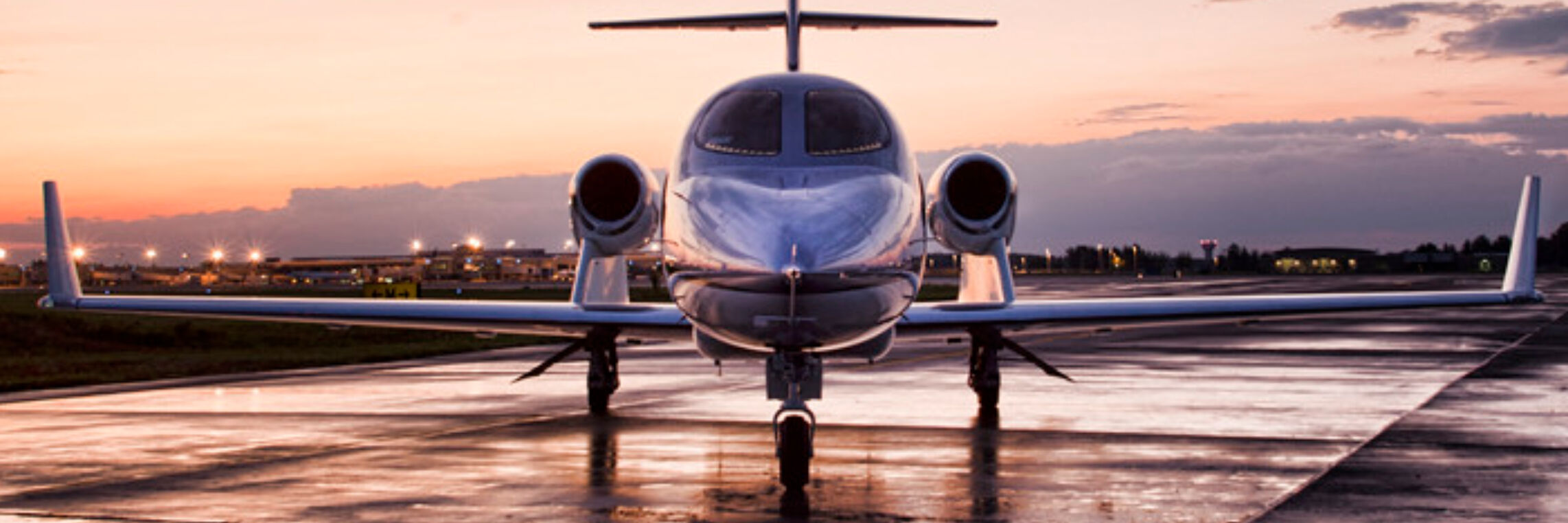 Private jet on runway at sunset, commercial video production
