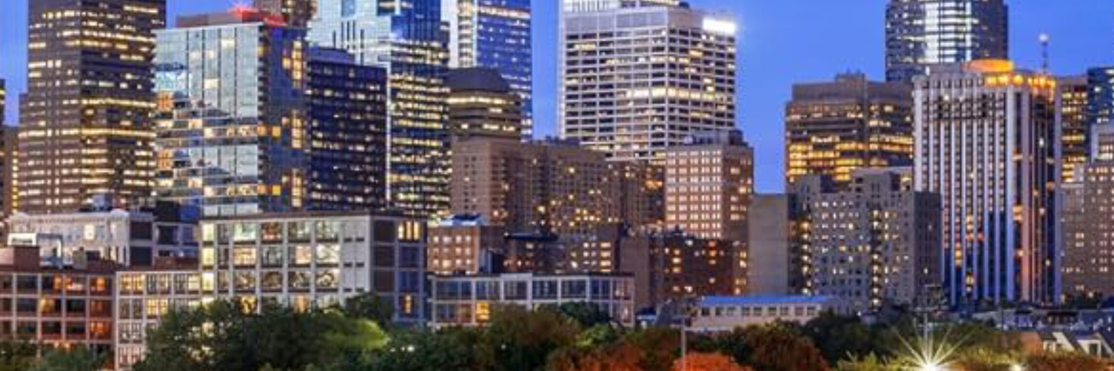 City skyline at dusk, real estate video and photo production