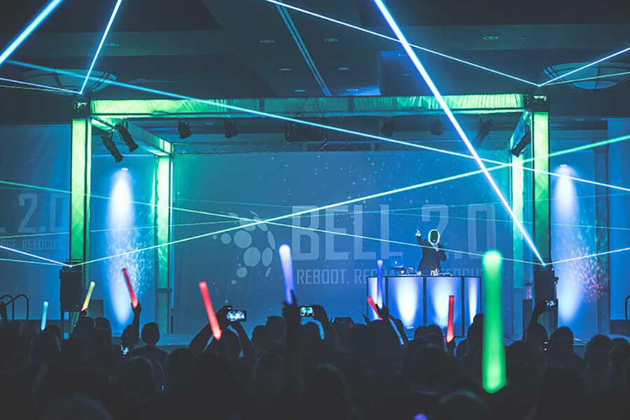 Corporate event stage lighting design with laser lights, Bell Partners conference
